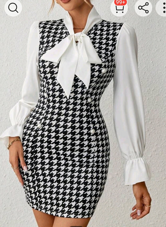 Robe moulante a imprime pied de poule et manches bouffantes